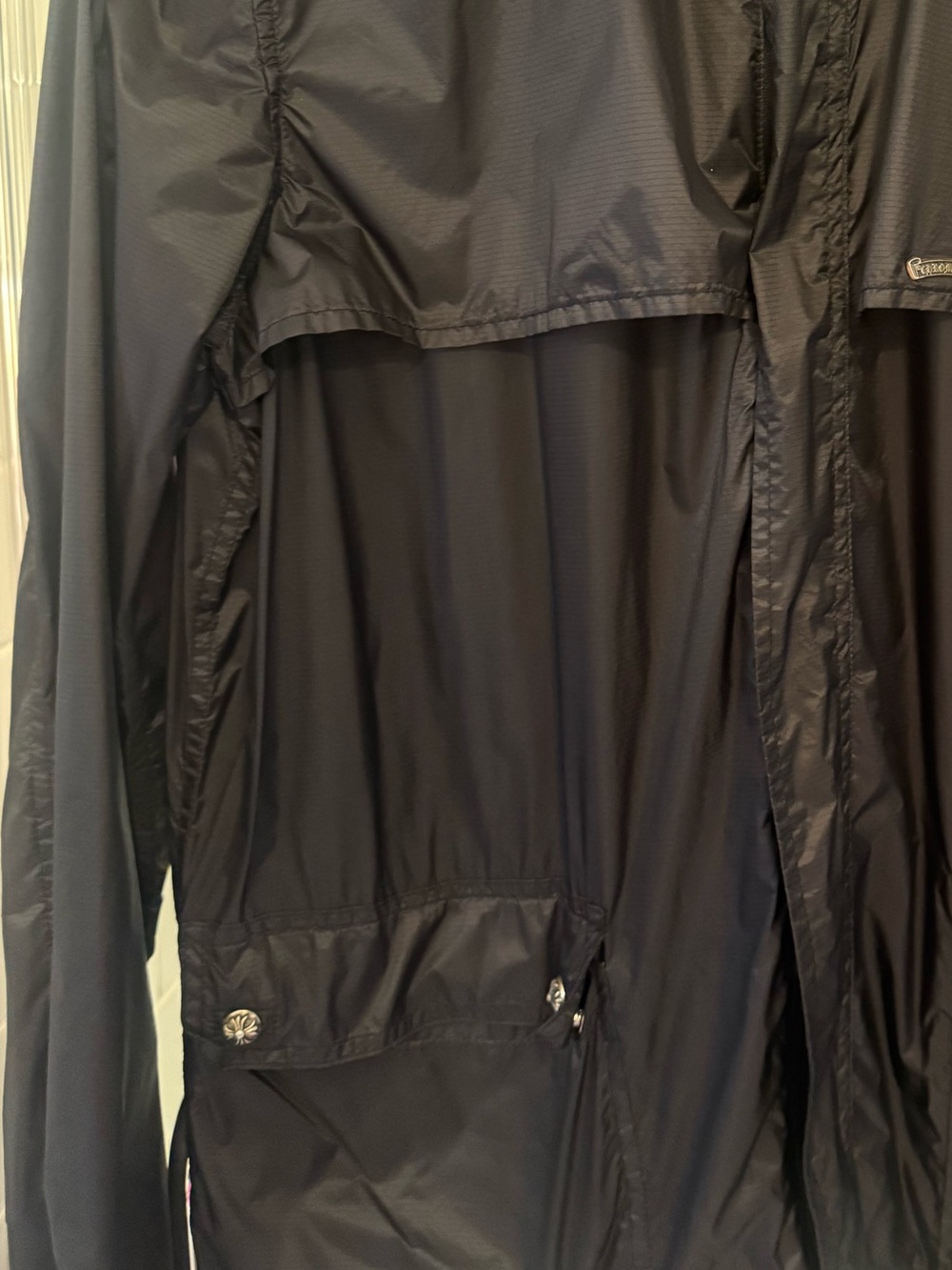 Black windbreaker
